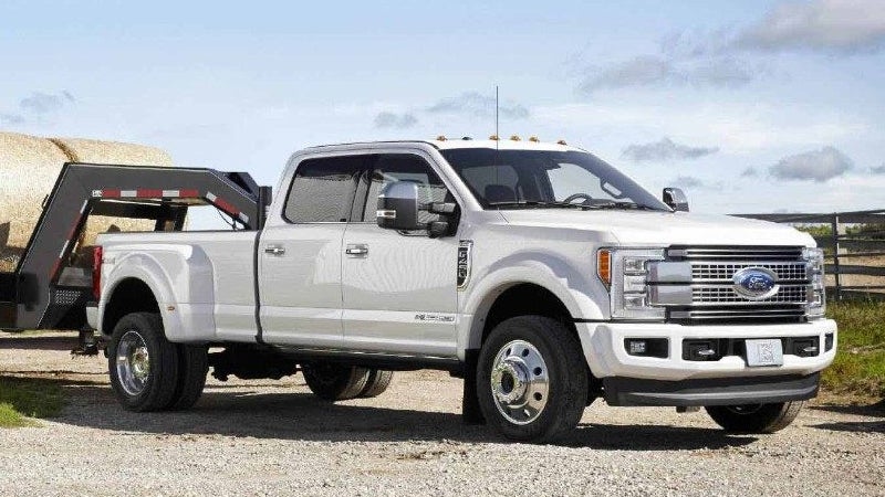 Blue Ford Super Duty truck .