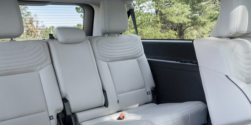 Rear passenger seating area inside the SUV.