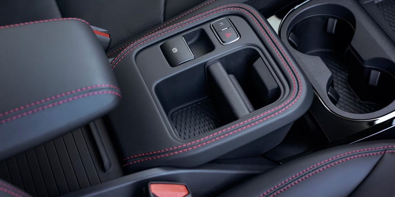Close-up of the vehicle's center console and storage compartment.