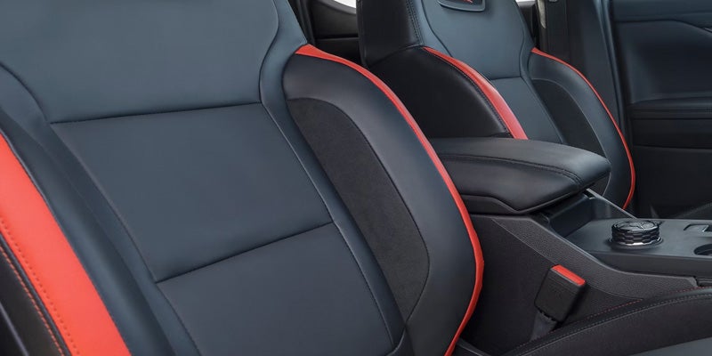 Vehicle seats featuring contrast stitching and accent trim.
