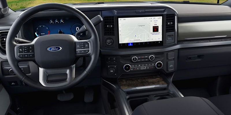 Dashboard touchscreen displaying vehicle controls and connectivity features.